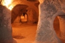 stunted growth man shows us his cave, Turkey